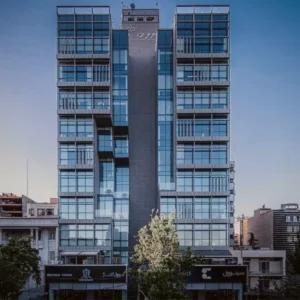 HVAC mechanical execution of Mika 911 office building in Tehran with exposed modern design including visible ducts and air conditioning equipment in industrial architectural style